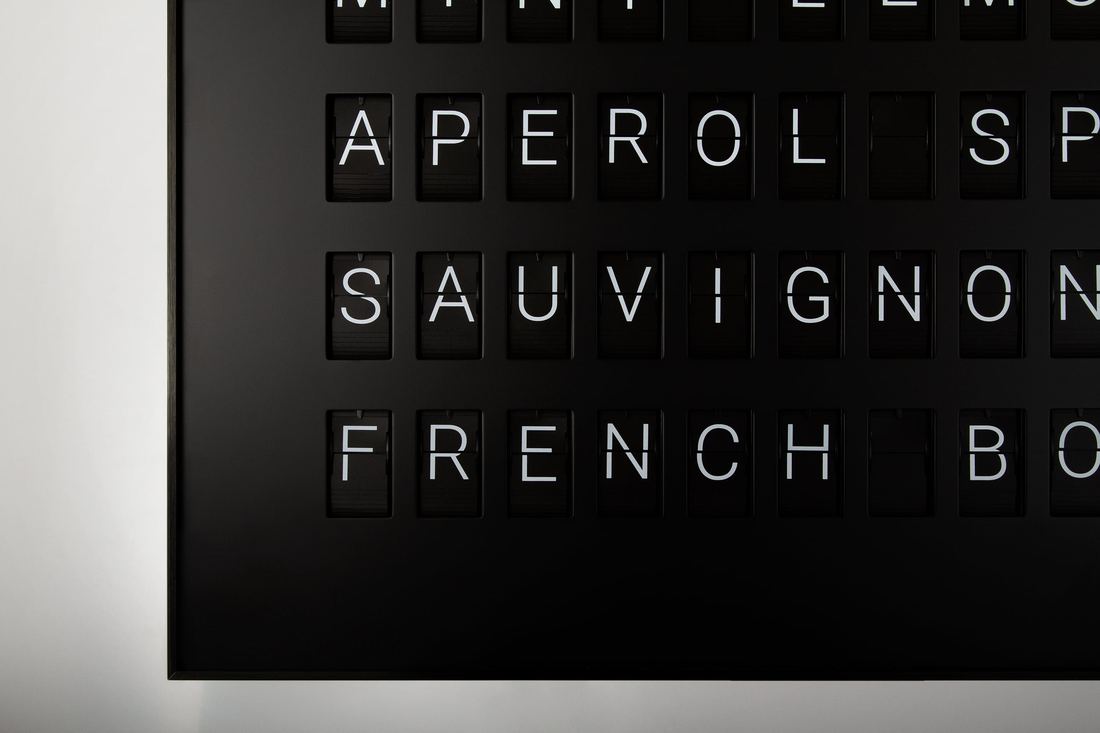 Close-up detail of Vestaboard's individual split-flap character units